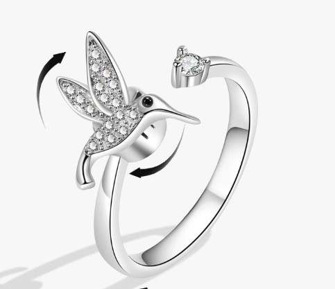 Humming bird spinning ring